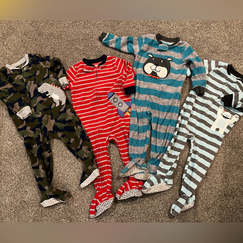 Gently used set of 4 Carters jammies. 18 months.
